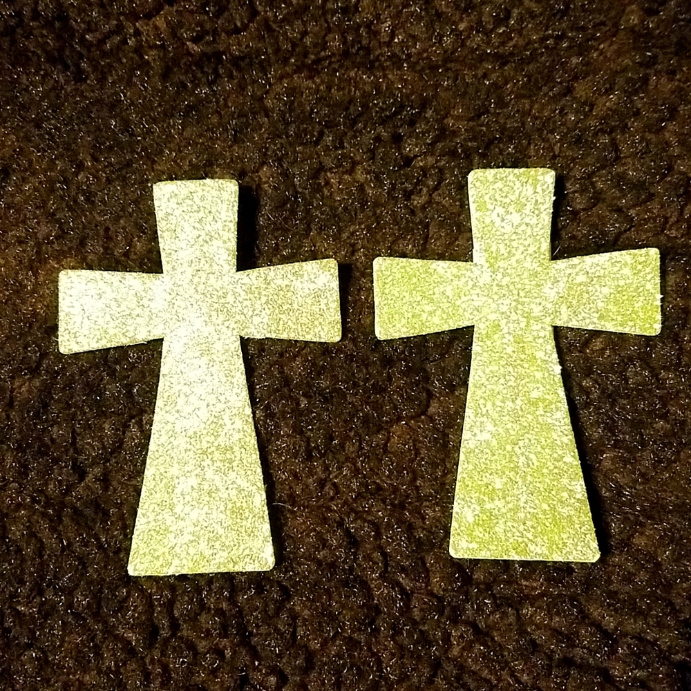 Set of two sparkly, green crosses.  They're made of foam.